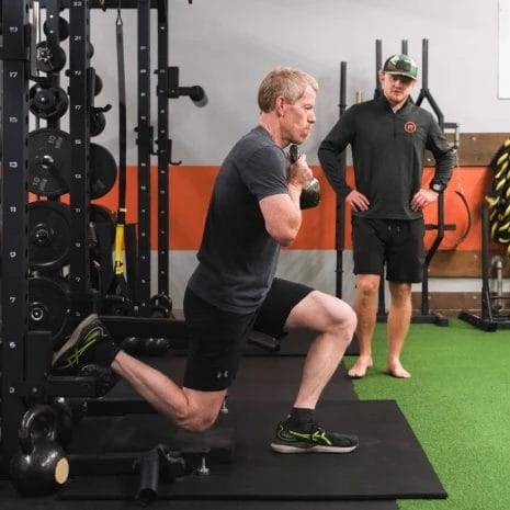Man working out with kettlebell